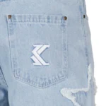 Karl Kani OG Baggy Paint Splatter Bleached Blue Jeans-back pocket